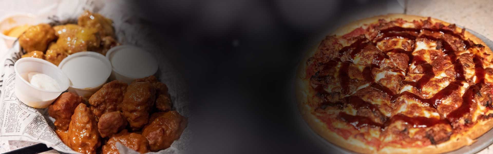 Buffalo wings and barbecue pizza at Mo's Pub